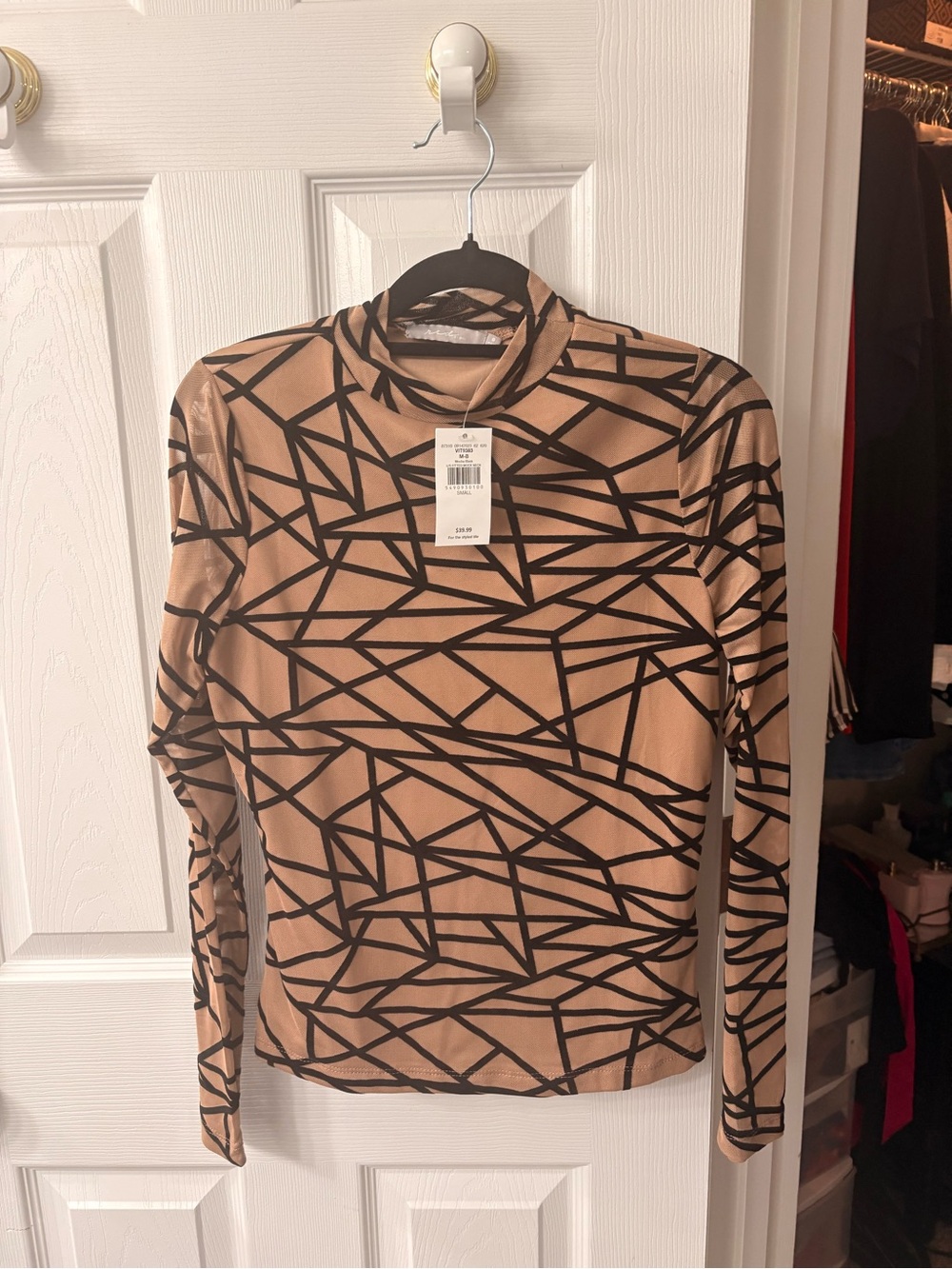 Buckle Tan Long-Sleeve Mock Neck Top with Black Geometric Print
